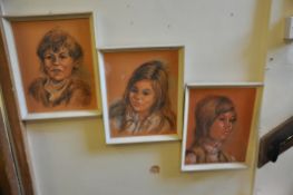 John Lowe - 1970's - 3 pastel portrait studies of children, signed to each corner. All framed.