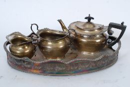 A Victorian hallmarked silver tea service comprising a teapot, sugar bowl and creamer. Hallmarked