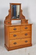 An Edwardian satin walnut dressing table chest of drawers. The drawers to main body with swing