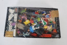 A tray of vintage retro pieces to include football figures, Bart Simpson etc