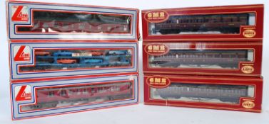 Three Lima boxed railway train set carriages to include car transporter 309053W , 305332W ,