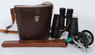 An American USAF load adjuster action with cased binoculars together with a Penn Delmar fishing