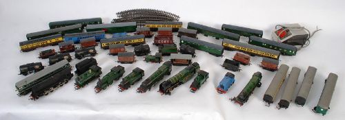 A large collection of vintage railway train set items to include trains, locomotives, tenders,