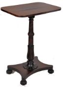 An early 19th century Regency rosewood lamp / hall / occasional table. A decorative tulip column