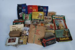 A collection of vintage wooden jigsaw puzzles to include Lumar, Waddingtons, William Tell and many