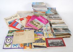 A lot to include many postcards, maps and cigarette cards.
