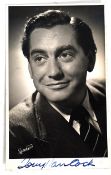 TONY HANCOCK - British Comedian. A signed autograph head and shoulders pose of Hancock looking to