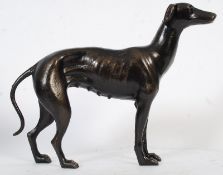 A 20th century cast metal statue figurine of a greyhound dog. 27cm tall.