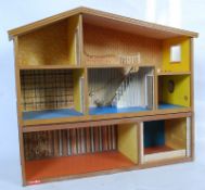 A retro 1970's Lundby extending dolls house set over 3 floors bearing makers name to base.