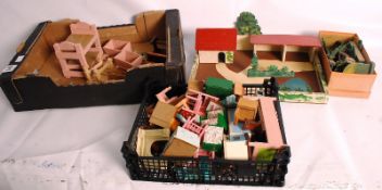 A 20th century wooden constructed childs farm, with accessories and wooden animals, along with a