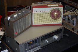 A vintage Phillips radio along with a Defiant and a Technics tape deck