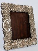 A large circa 1860 roccoco continental silver photo frame, the inner dimensions being 20cm x 17cm.