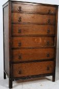 A good 1930's Art Deco oak tall chest of drawers. Raised on square legs with a bank of 6 drawers