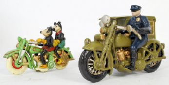 Two vintage style cast metal figurines. One of a seated motorcycle riding postman, the other of a