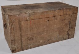 An early 20th century pine workmans tool chest / trunk in original condition having hinged lid