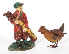 A 20th century cast iron sporting themed golf door stop in the form of a gentleman with gold clubs