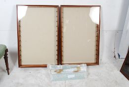 A pair of custom made wall hanging diecast toy display cabinets. Glass fronts with glass shelves.