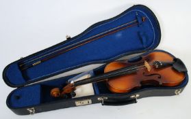 A cased contemporary violin with bow and accessories