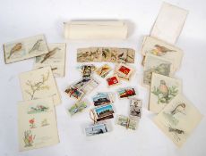 A selection of mixed ephemera to include a collection of watercolours / pastel pictures of
