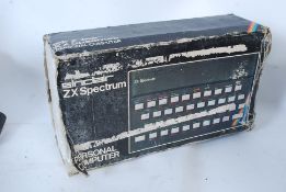 A boxed original 1980's ZX Spectrum computer complete in its original box