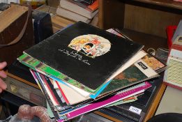 A collection of lps to include Earth Wind and Fire, The Beach Boys, Queen, R Dean Taylor etc