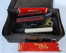 A collection of vintage Triang / Hornby trains and train set parts to include carriages, and track