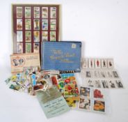 A collection of vintage cigarette cards to include Wills Furniture, Black Cat cigarette cards, The