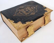A Victorian leather and brass bound Holy Bible, The National Comprehensive Family Bible edited by