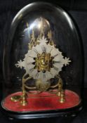 A 19th century skeleton fusee clock set within a glass dome and ebonised plinth being unsigned.