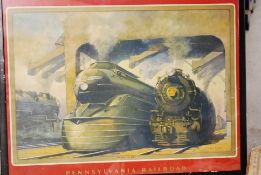 A framed and glazed advertising poster for the Pensylvania Railroad