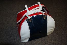 A vintage leather ten pin bowling bag together with a Brunswick bowling ball