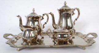 A 20th century silver plate contempory tea service on a large decorative tray including teapot etc.