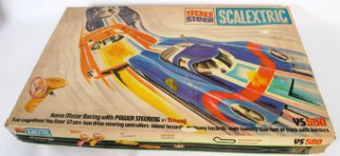 A rare vintage Triang Scalextric Y5500 You Steer boxed racing set, with controllers and cars.