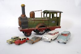 A collection of Dinky diecast cars to include 1950's Lesney miniature die cast cars and a tin