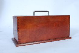 A 1930's Art deco mahogany cased games / poker set complete with chips  and playing cards