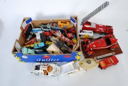 A tray of cars to include Dinky, Matchbox etc along with a Burago Alfa Romeo model car on stand