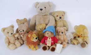 A box of teddys to include Paddington bear etc.