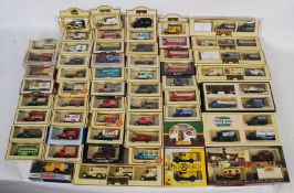 A quantity of boxed diecast toy cars and vehicles to include Dinky, Lledo, Days Gone and others.