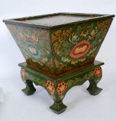 A hand painted Chinese oriental style green plant stand with foliate decoration
