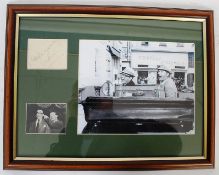 MORECAMBE & WISE: A framed autograph display comprising of an early black and white agency