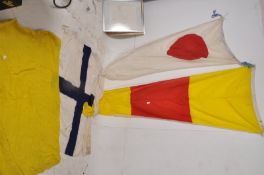 A collection of vintage hand stitched shipping line flags / pennants in white,yellow blue cross etc