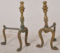 A pair of 19th century brass stub andirons / fire dogs in the Art Nouveau manner
