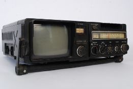 A vintage / retro 1970's Hitachi portable radio / television.