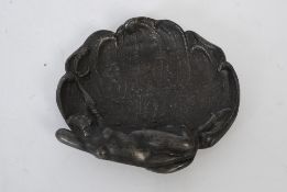 An unusual pewter Art Nouveau pin dish with recumbant lady to side
