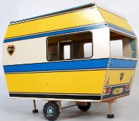 An original complete in box (virtually un-used) Sindy Doll caravan retaining the bright original