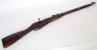 An original world war 2 deactivated Russian assault rifle Mosin Nagant SKS being dated to 1940