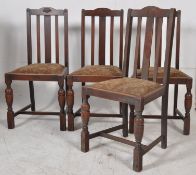 A set of 4 1930's Oak rail back dining chairs. Drop in seats on turned legs with stretchers having