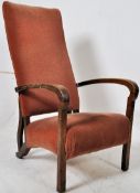 A 1930's Art Deco bentwood armchair in the manner of Heals having velour upholstered frame with