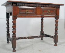 An early 18th century  country Jacobean lowboy writing table desk. The bobbin turned legs united