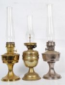 3 Victorian and later oil lamps, all with glass chimneys. Two being Aladdin 23 make, the other with